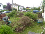 FZ005432 Jenni and the hedge in the front garden.jpg
